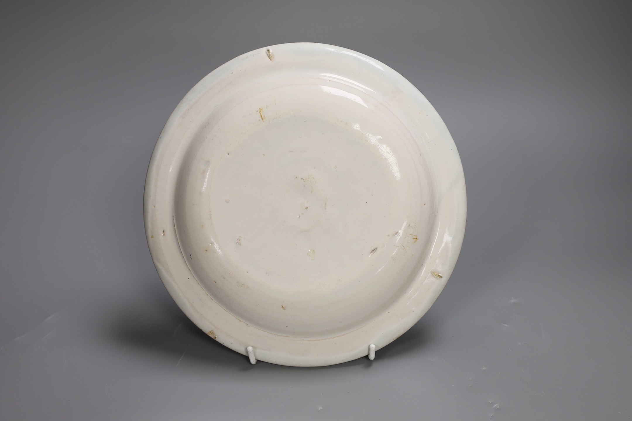 A Delft polychrome marriage plate, dated 1754, 22cm